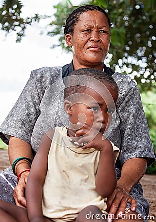 Bushman granny with child Stock Photo