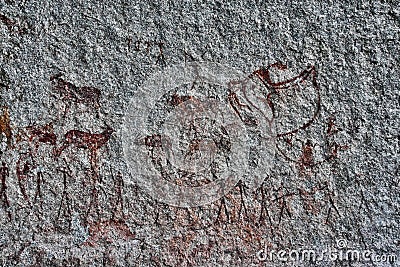 Bushmen rock painting of human figures and antelopes, giraffe of the Matopos National Park, Zimbabwe Stock Photo