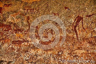 Bushmen rock painting of human figures and antelopes, giraffe of the Matopos National Park, Zimbabwe Stock Photo