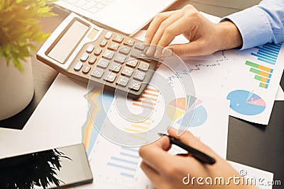 Businesman working on stock market graphs and charts Stock Photo