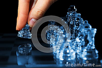 Strategy chess game woman fingers moving pawn Stock Photo