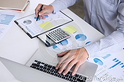 Business accountant or banker, businessman calculate and analysis with stock financial indices and financial costs wisely and car Stock Photo