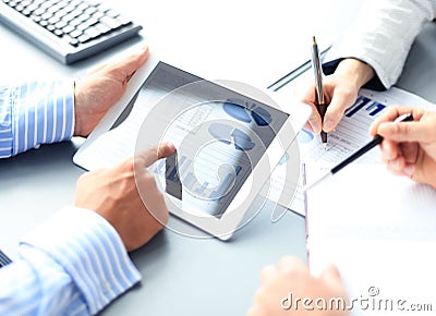 Business adviser analyzing financial figures Stock Photo