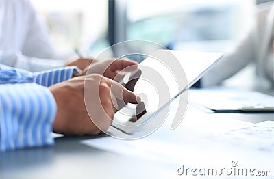 Business adviser analyzing financial figures Stock Photo