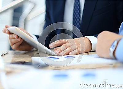 Business adviser analyzing financial figures Stock Photo