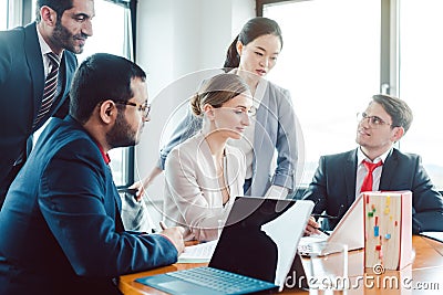 Business advisors structuring a deal Stock Photo