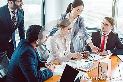 Business advisors structuring a deal Stock Photo