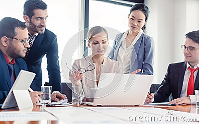 Business advisors structuring a deal Stock Photo