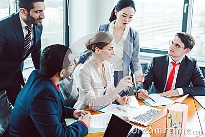 Business advisors structuring a deal Stock Photo