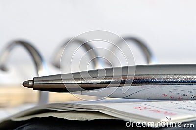 Business agenda and pen Stock Photo