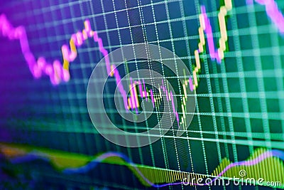Business analytic with tablet pc and laptop computer. Stock market graph. Financial charts on the table with laptop. Stock Stock Photo