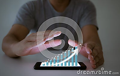 Business analyze graphs with the technology development pointing graph corporate success and growing plan concept Stock Photo