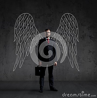 Business angel on a dark background Stock Photo