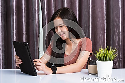 Business beautiful woman video call conferencing, write, check or read mail on digital tablet computer Stock Photo