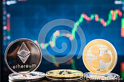 Business bitcoin, ethereum and XRP coins currency finance money Editorial Stock Photo