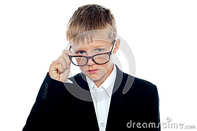 Business boy looking through his eyeglasses Stock Photo