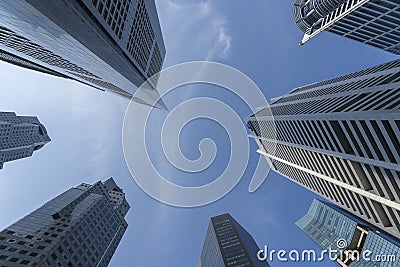 Business buildings skyline looking up with blue sky background. High-rise skyscraper, modern architecture Editorial Stock Photo