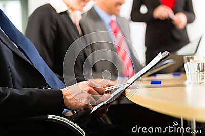 Business - businesspeople, meeting and presentation in office Stock Photo