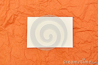 Business card on orange background. Mockup template Stock Photo