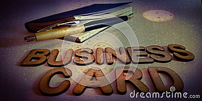business card presented on water drops abstract background with diary and pen Stock Photo