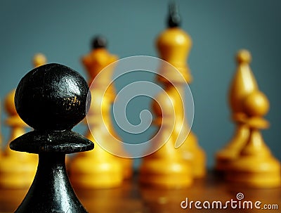 Business challenge and competition. Black pawn opposite white chess Stock Photo