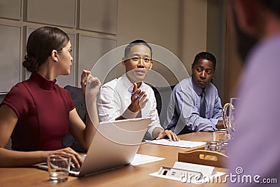 Business colleagues in discussion at a meeting, close up Stock Photo