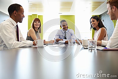 Business colleagues at informal meeting, surface level view Stock Photo