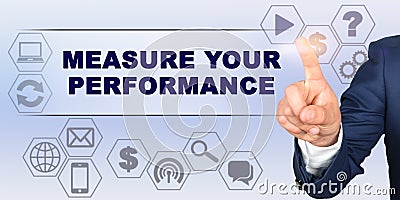 Businessman touching virtual screen with his finger. Screen caption - MEASURE YOUR PERFORMANCE Stock Photo