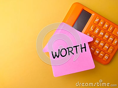 sticky note with the word WORTH Stock Photo