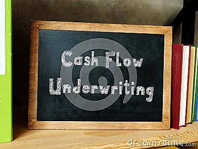 Business concept about Cash Flow Underwriting with sign on the sheet Stock Photo