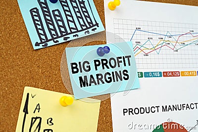 Business charts and stickers with the inscription hang on the board - Big Profit Margins Stock Photo