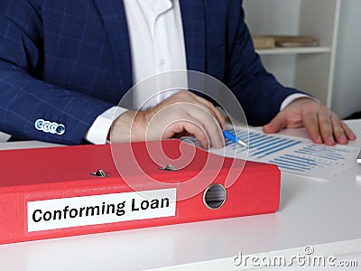Business concept about Conforming Loan with phrase on the folder for documents Stock Photo