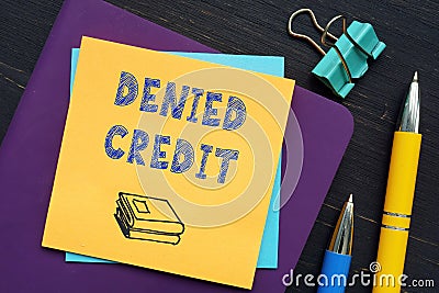 Business concept about DENIED CREDIT with inscription on the sheet Stock Photo
