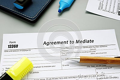 Business concept about Form 13369 Agreement to Mediate with inscription on the page Stock Photo