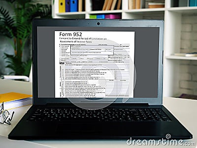 Business concept about Form 952 Consent to Extend Period of Limitation on Assessment of Income Taxes with sign on the sheet Stock Photo