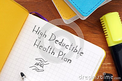 Business concept about high deductible health plan with sign on the piece of paper Stock Photo