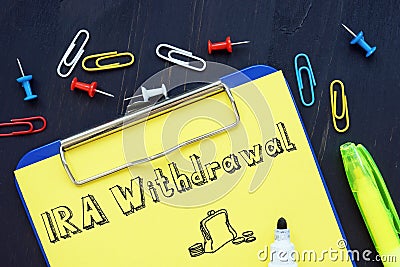 Business concept about IRA Withdrawal with sign on the sheet Stock Photo