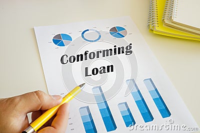 Business concept meaning Conforming Loan with sign on the chart sheet Stock Photo