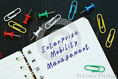 Business concept meaning Enterprise Mobility Management EMM with inscription on the sheet Stock Photo