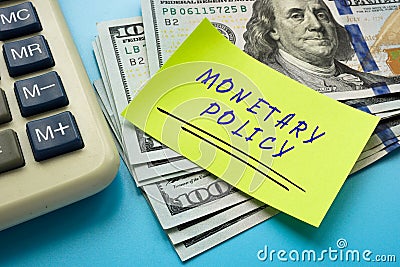 Business concept meaning MONETARY POLICY with sign on the sheet Stock Photo