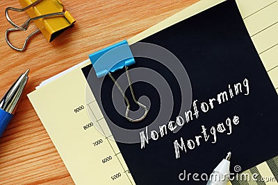 Business concept meaning Nonconforming Mortgage with sign on the piece of paper Stock Photo