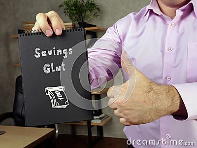 Business concept meaning Savings Glut 5 with sign on the page Stock Photo