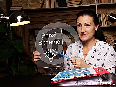 Business concept about Ponzi Scheme with inscription on blank notepad Stock Photo