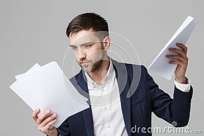 Business Concept - Portrait Handsome Business man serious working with annual report. isolated White Background. Copy space. Stock Photo