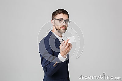 Business Concept - Portrait Handsome Business man showing name card with smiling confident face. White Background.Copy Space. Stock Photo