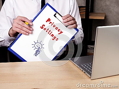 Business concept about Privacy Settings with phrase on the piece of paper Stock Photo