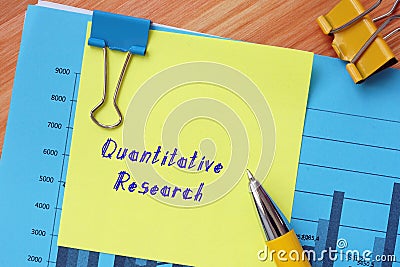 Business concept about Quantitative Research with phrase on the sheet Stock Photo