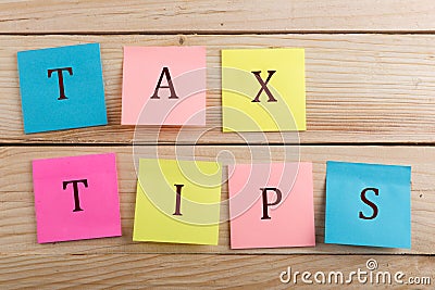 Business concept for taxpayer - Many colorful sticky note with text Tax tips Stock Photo