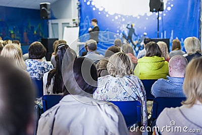 Business Conference Concept and Ideas. Female Lecturer Speaking Editorial Stock Photo