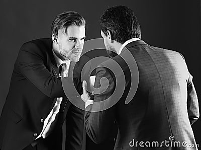 Business confrontation concept. Man in jacket or businessman Stock Photo